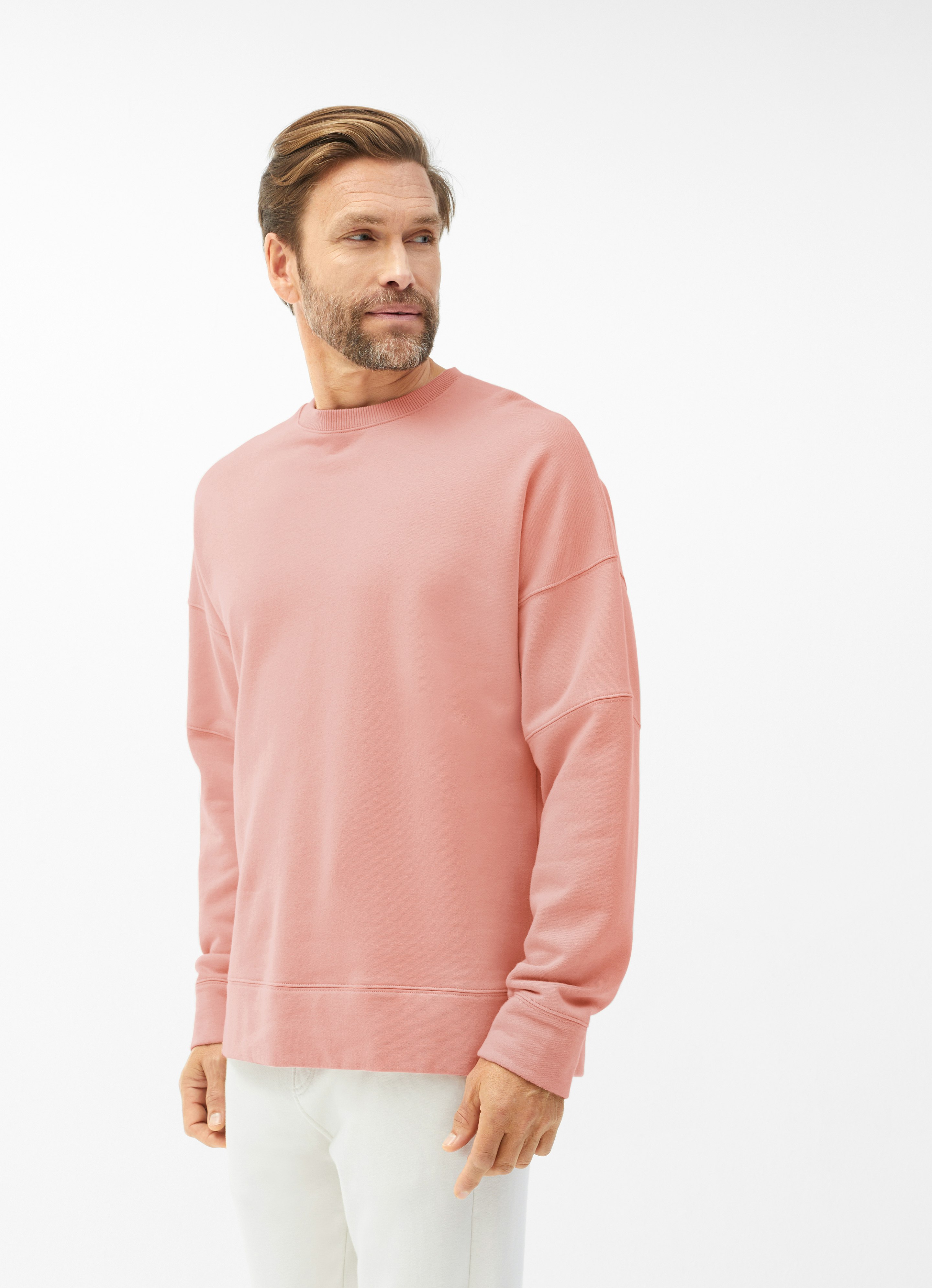 salmon colored sweatshirt